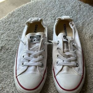 White Converse slip on sneakers